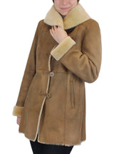 Beige Fitted Raw Edge Shearling Jacket by by Blue Duck. Made in U.S.A. Size Small.